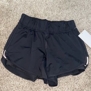 Strides Ahead High rise short 4”